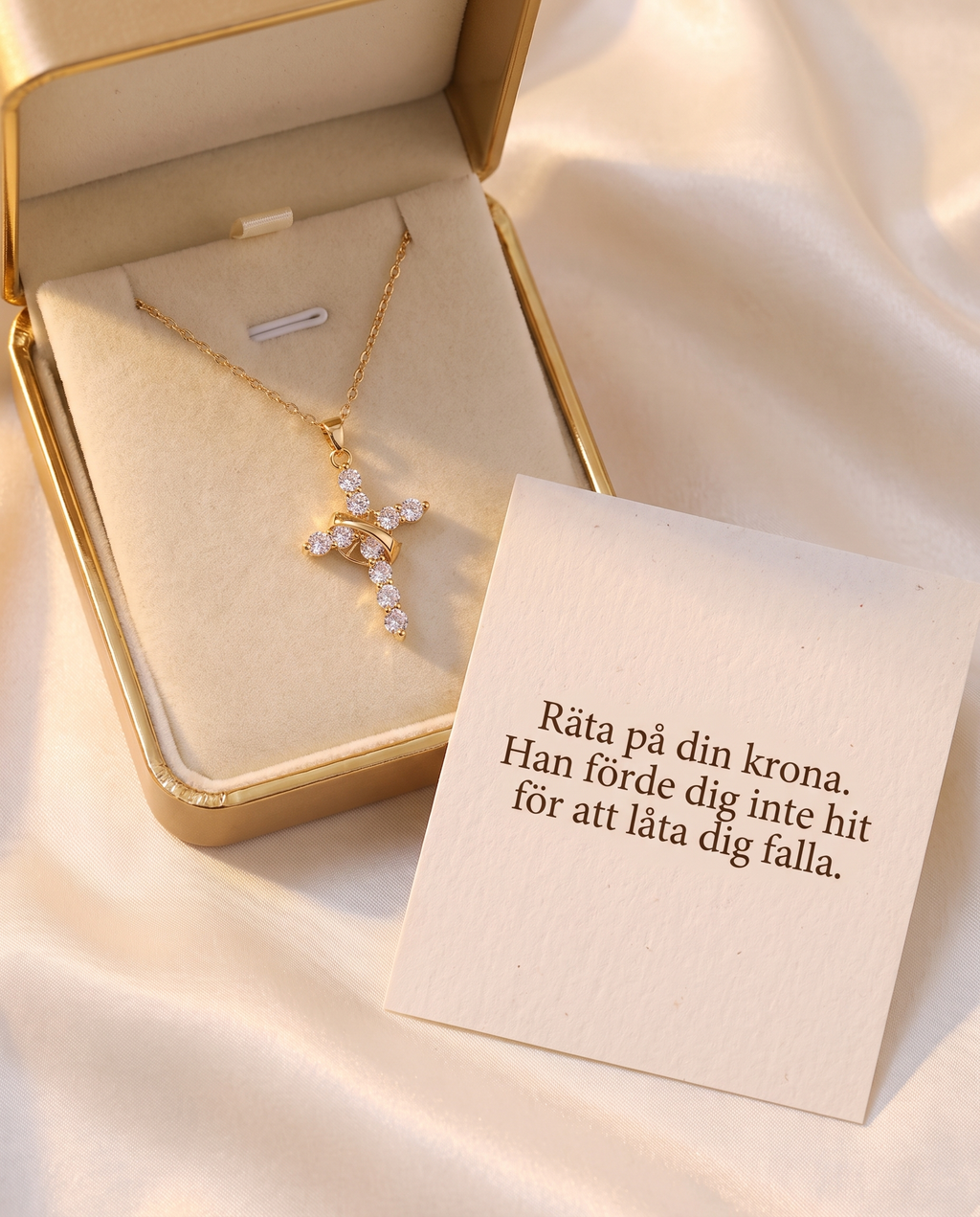 Presentask med korshalsband och budskapskort på svenska